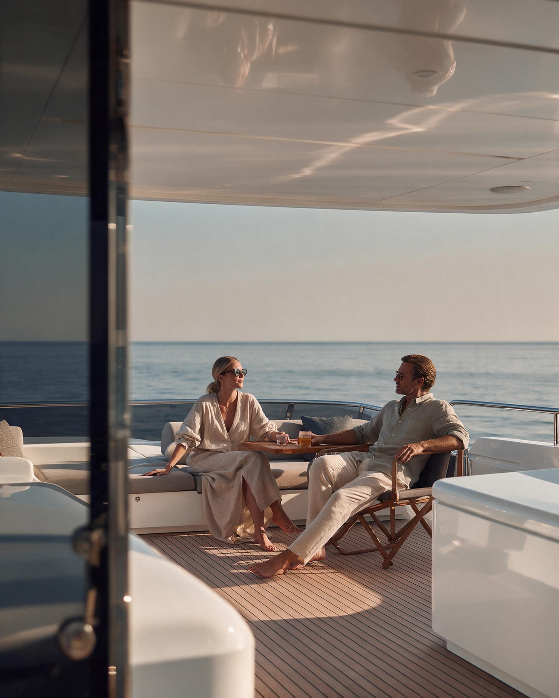 Guests relaxing on the shaded aft deck of Aurora
